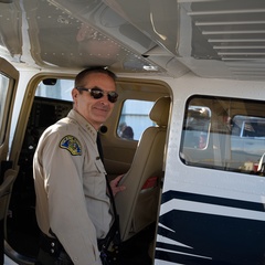 Sheriff Boudreaux is pictured with one of two new Cessna aircraft for the Sheriff's Office.